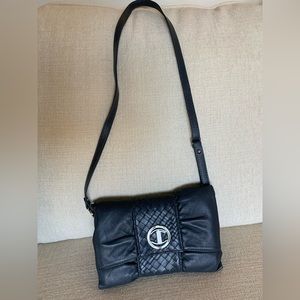 Jennifer Tattanelli clutch bag with removable strap, dark grey.